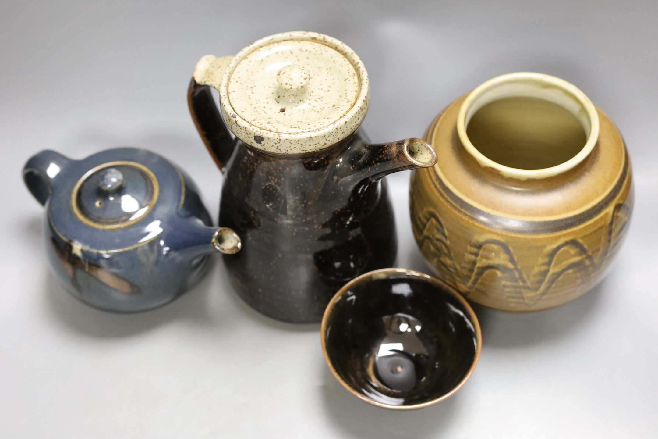 Geoffrey Whiting (1919-1988), a studio pottery teapot and coffee pot, a vase, together with an unattributed porcelain bowl. (4)-coffee pot 22cms high.